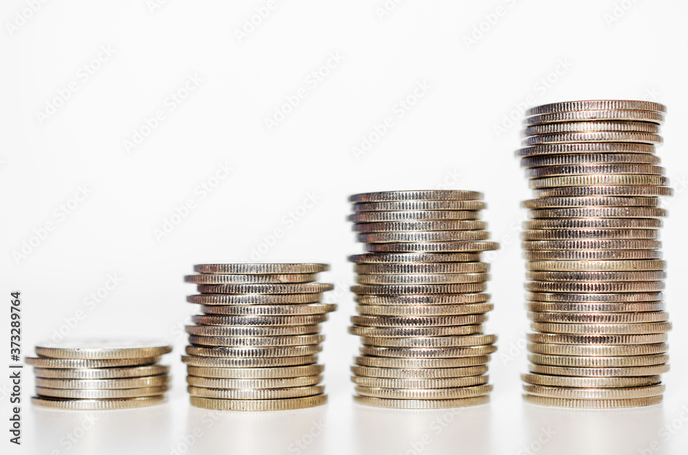 silver coin stack growth up isolated on white background with clipping path. money saving, financial grow, business startup, economy budget and investment concept. silver coin stack growth up isolated on white background with clipping path. money saving, financial grow, business startup, economy budget and investment concept.
