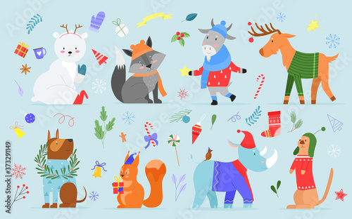 Fototapeta Naklejka Na Ścianę i Meble -  Christmas animal vector illustration set. Cartoon cute hand drawn zoo collection with funny animal characters enjoy xmas holidays, dressed in winter costumes or accessories, sweater, hat and scarf
