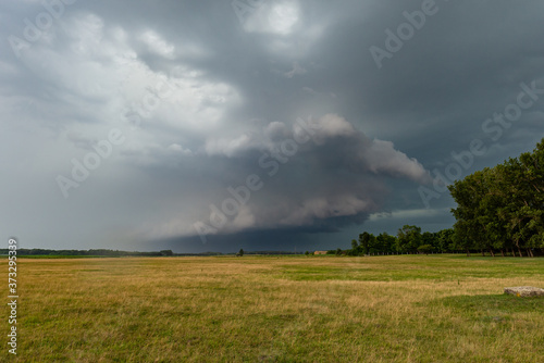 Wall cloud of a supercell thunderstorm over the Pannonian Plains, central Europe © Menyhert