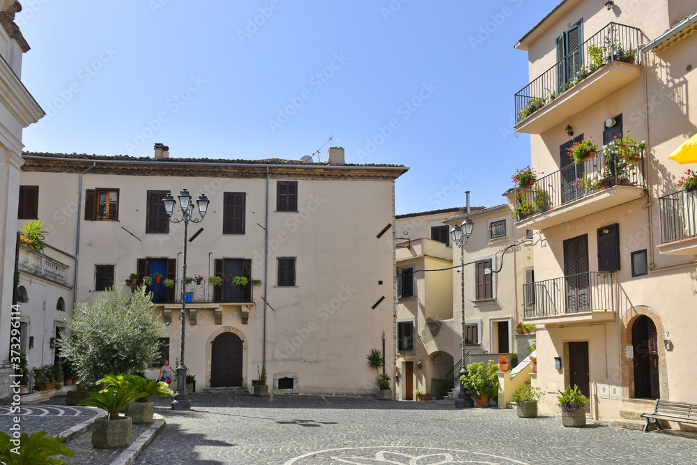 A small square among the old houses of Giuliano di Roma, a rural village in the Lazio region.