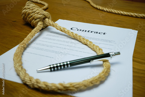 Bild auf Leinwand Contract with pen and rope tied in hangmans noose