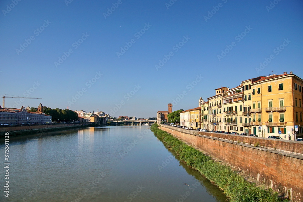 River Arno passing through the historic center of Pisa in Pisa, Italy