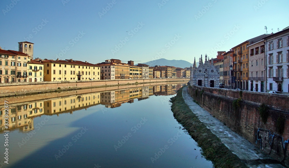 Lungarno Antonio Pacinotti and the tidal river Arno in Pisa, Tuscany, Italy
