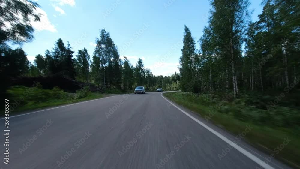 Time lapse traveling with car on a road surrounded by trees. Time lapse traveling with car on a road surrounded by trees.