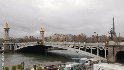 Pont Alexandre III Over The Seine River With The Eiffel Tower On The Background In Paris, France.  -wide shot photo
