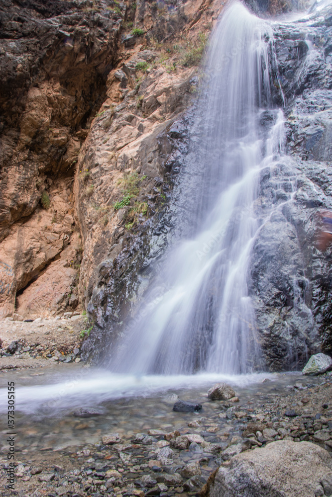 Fototapeta premium beautiful waterfall next to the river in Ourika valley 