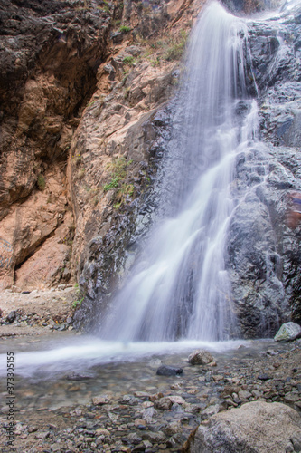 beautiful waterfall next to the river in Ourika valley 