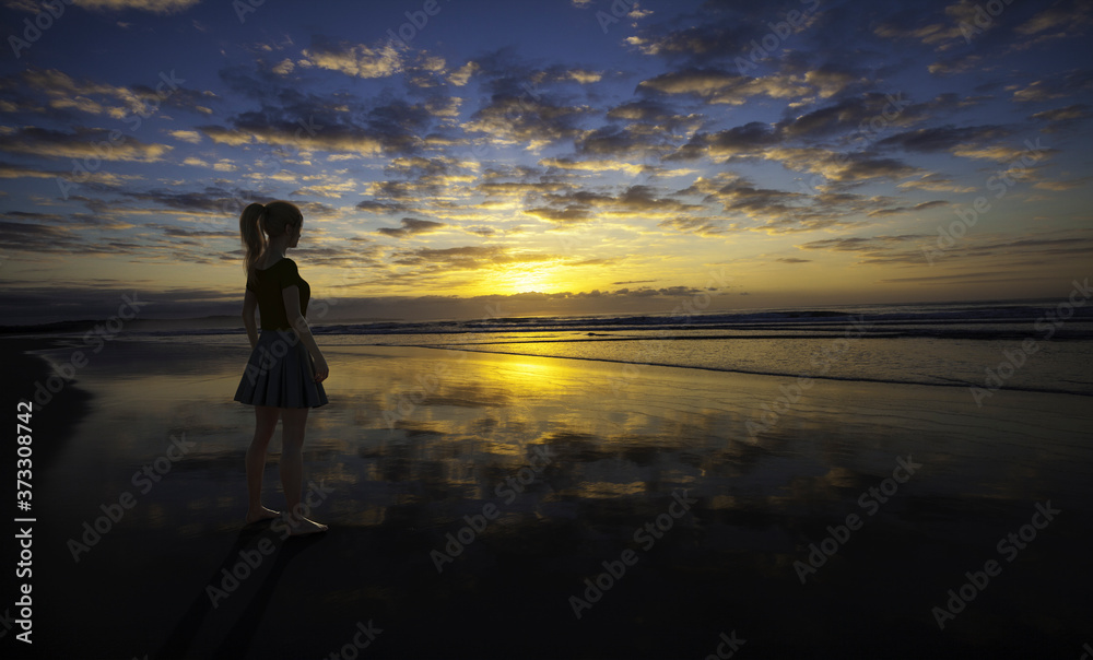3D render entitled Looking at sunset. Person in the image is computer generated by 3D rendering. No model release is needed as the person is fictitious.'