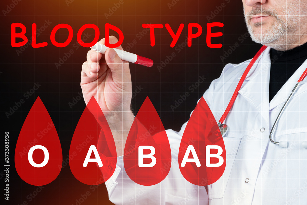 Blood transfusion. Medic draws lifeblood logo on screen. Doctor next to ...