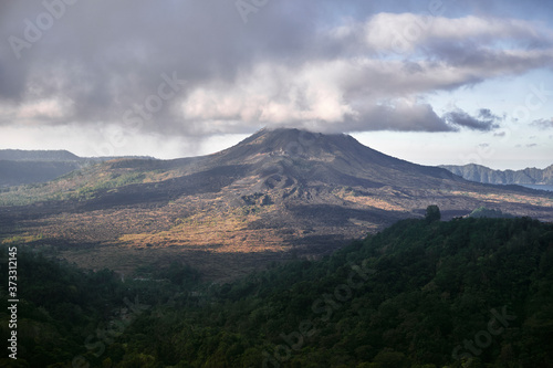 high volcano with clouds on Bali island