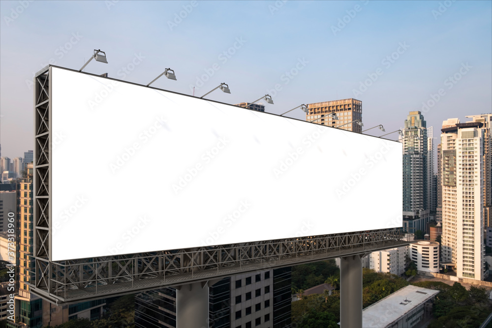 Fototapeta premium Blank white road billboard with Bangkok cityscape background at sunset. Street advertising poster, mock up, 3D rendering. Side view. The concept of marketing communication to promote or sell idea.