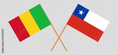 Crossed flags of Mali and Chile