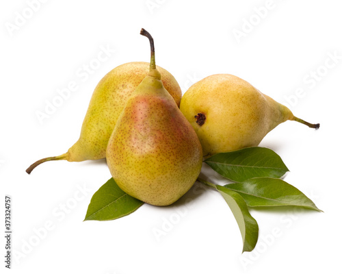 Three ripe pears with green leaf on white background.