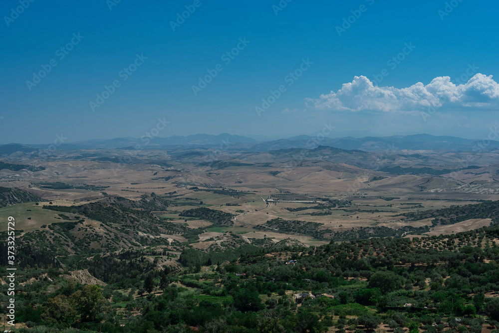 Ferrandina, a small town in Lucania perched on the hill and surrounded by olive trees. General view, landscape. Colors of southern Italy.
