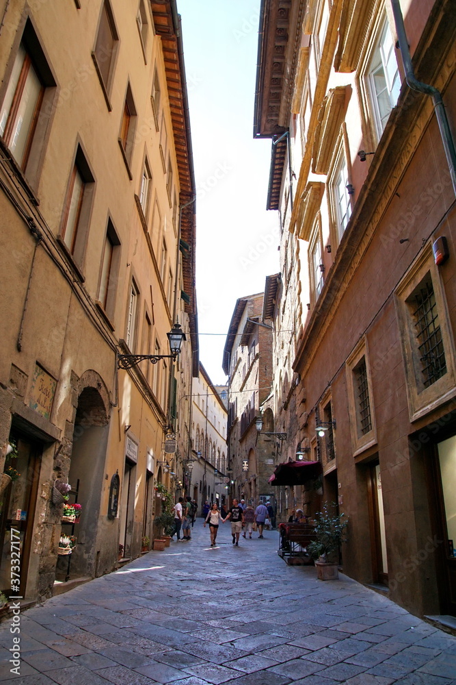 Charming narrow streets of Volterra town in Tuscany Italy