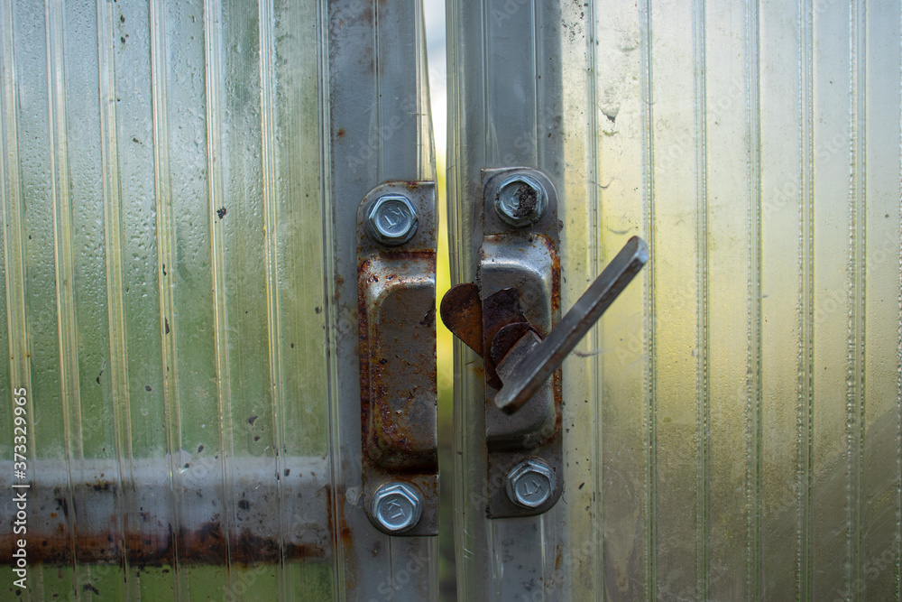 Close up view of the old rusty latch Close up view of the old rusty latch
