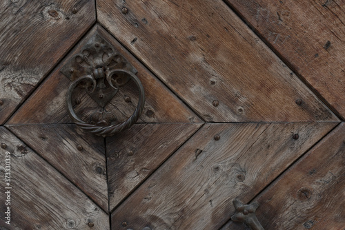 Malles Venosta typical. Detail of alpine door hinge. Carpenter details.