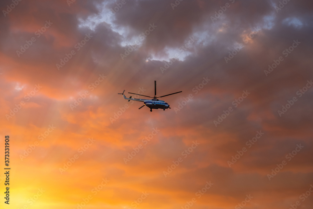The helicopter flies in the sky The helicopter flies in the sky