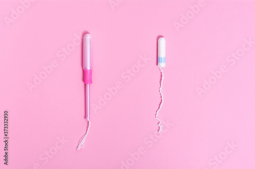 Tampon with applicator and tampon without applicator.