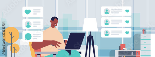 technology blogger recording online video blog live streaming blogging concept african american man vlogger using laptop living room interior horizontal portrait vector illustration