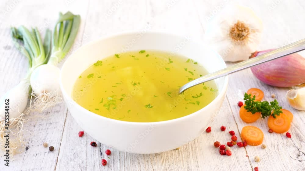 bowl of soup- vegetable soup and herbs