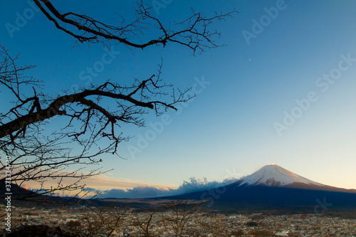 Fuji san in Japanese, Mount Fuji's exceptionally symmetrical cone, which is snow capped for about five months a year. It is a well known as the symbol of Japan.