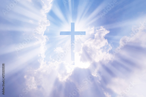 Christian cross appears bright in the sky
