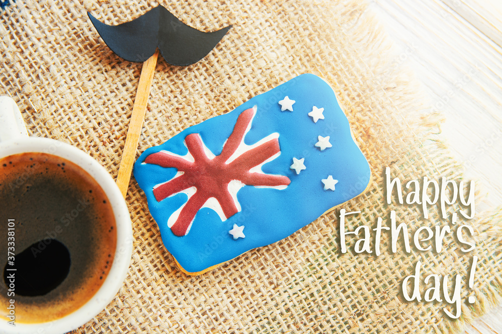 Happy fathers day in Australia - Hipster style Card with a cup of coffee, cookies, australian flag frosting and straw mustache for Dad's Day holiday