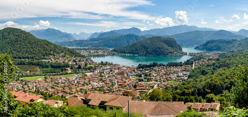Panorama of lake Lugano and Lavena Ponte Tresa town from Cadegliano Viconago village , province of Varese, Italy