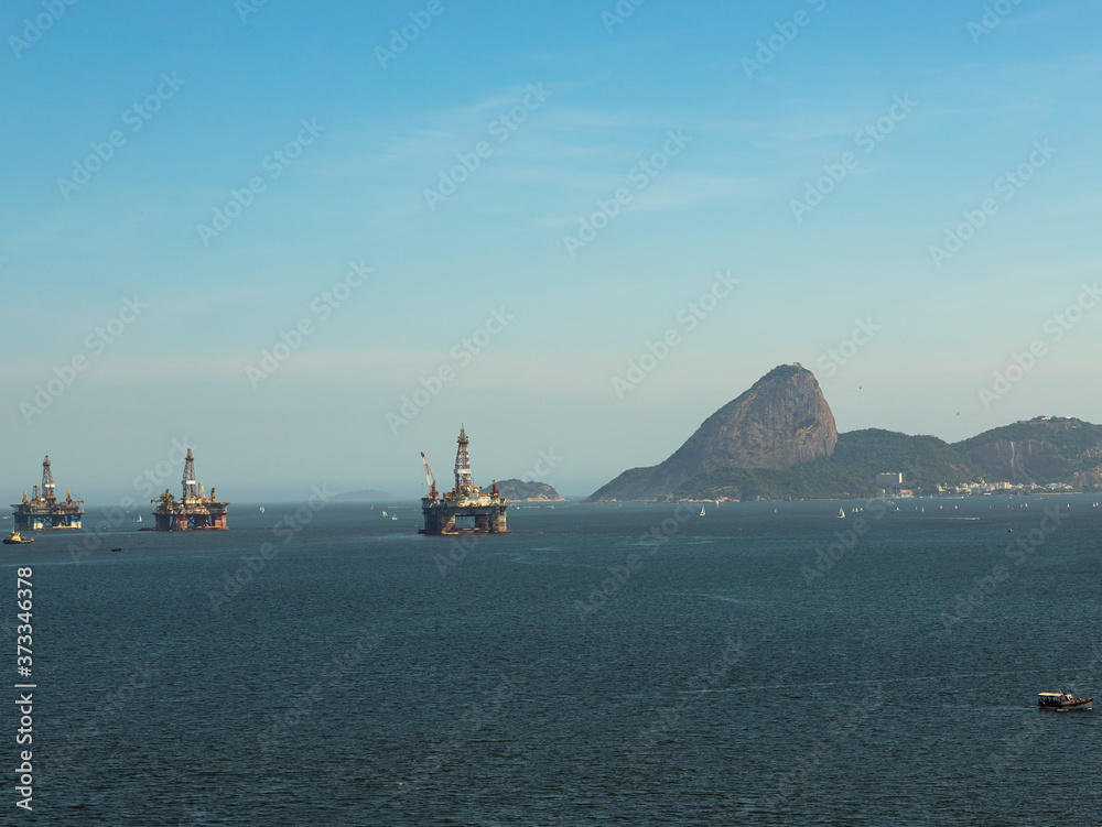 Fototapeta premium Oil and gas industry. Platform drilling in Sugar Loaf hill in Rio de Janeiro in Brazil.