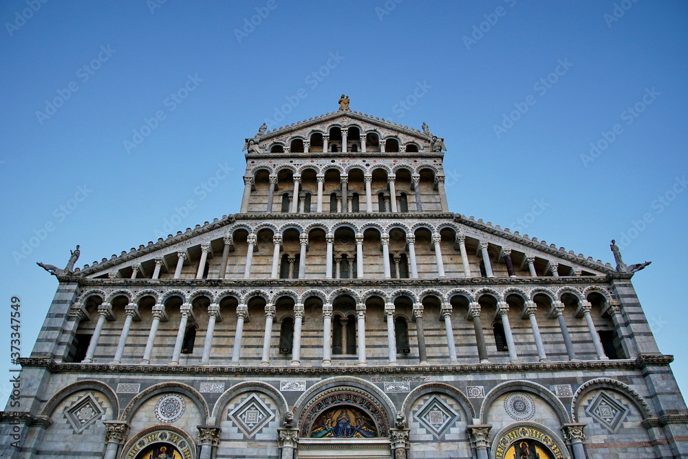 Pisa Cathedral is a medieval Roman Catholic cathedral dedicated to the Assumption of the Virgin Mary, in the Piazza dei Miracoli. It is a notable example of Romanesque architecture.
