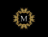 Callygraphic Badge M Letter Logo. Luxury Gold vintage emblem with beautiful classy floral ornament. Vintage Frame design Vector illustration.