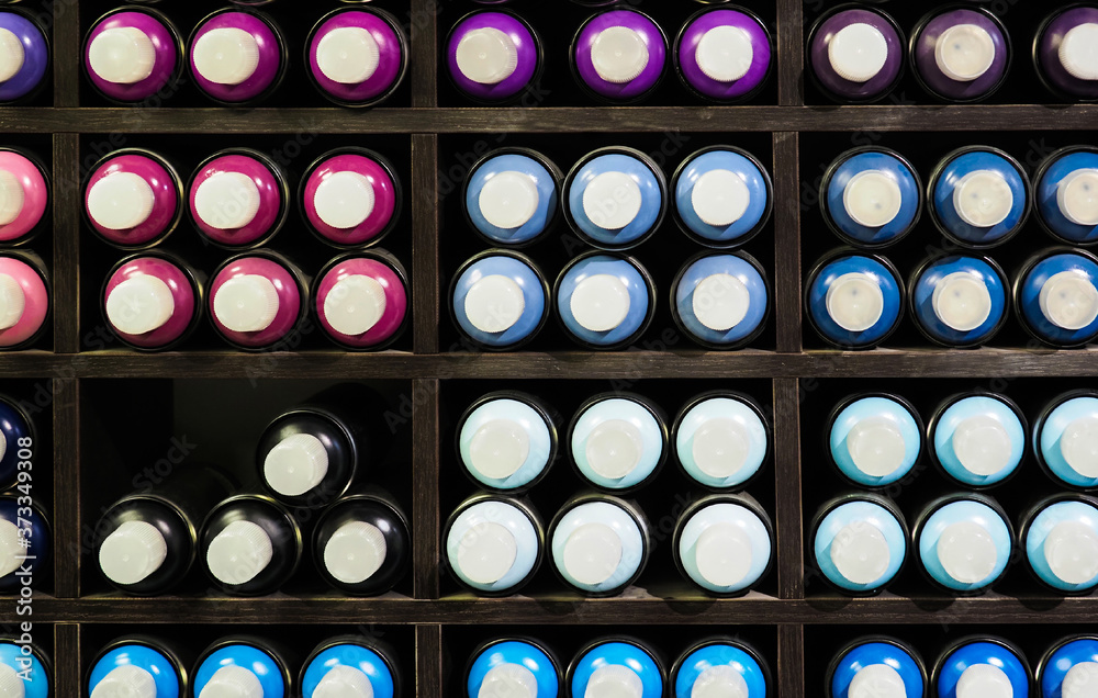 Paint dispenser, spray bottles, street art. Painted spray paint