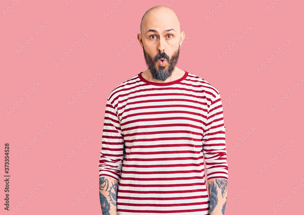 Young handsome man wearing casual clothes afraid and shocked with surprise expression, fear and excited face. Young handsome man wearing casual clothes afraid and shocked with surprise expression, fear and excited face.