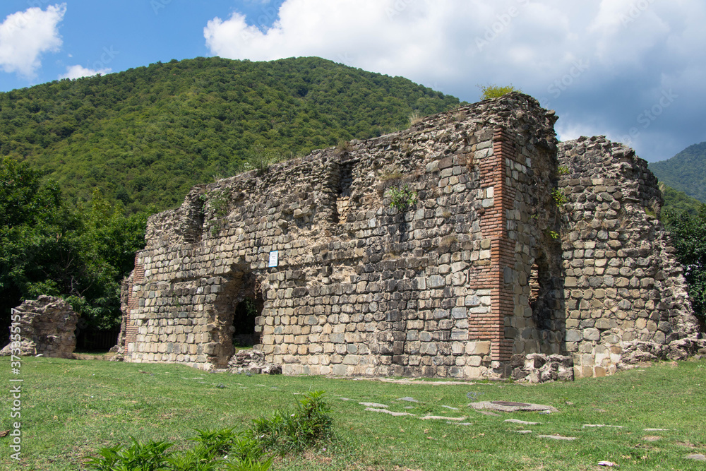 Old ruined Qum Basilica in Azerbaijan. Ancient christianity in Caucasia