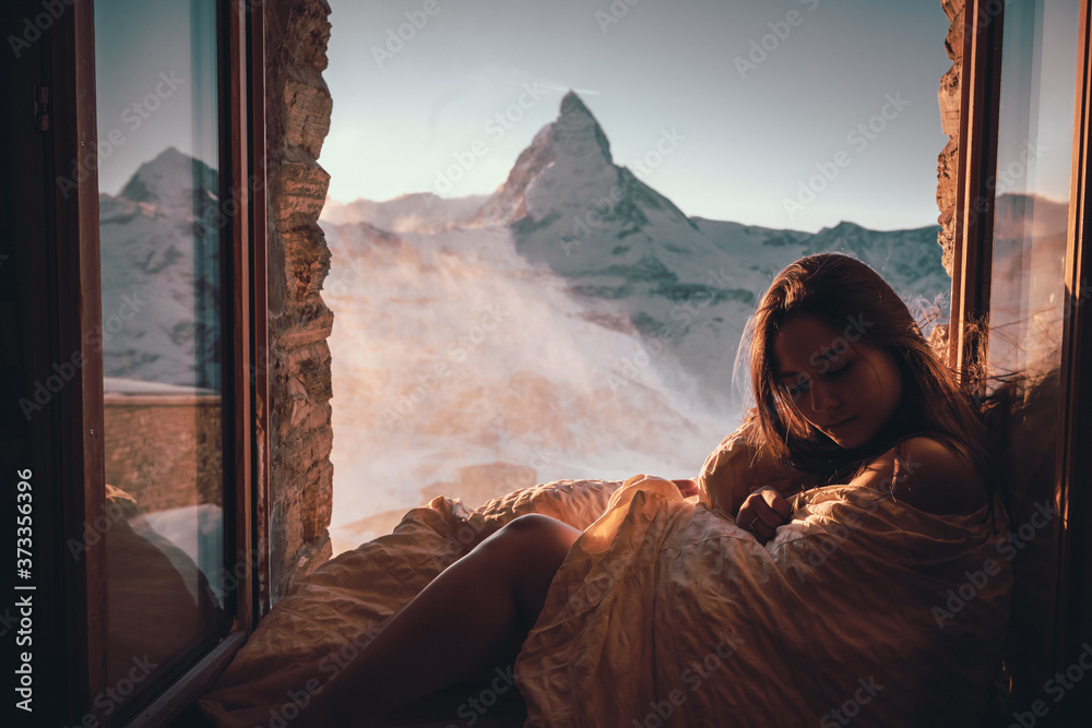 Woman tourist selfie near the Matterhorn mountain.Famous popular touristic place in the world. - obrazy, fototapety, plakaty 