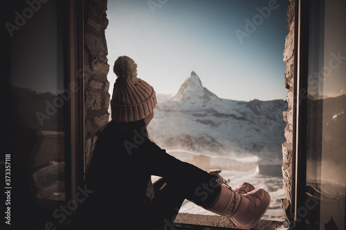 Wallpaper Mural Woman tourist selfie near the Matterhorn mountain.Famous popular touristic place in the world. Torontodigital.ca