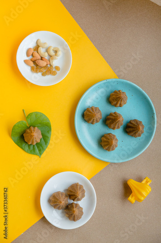 Modak is a tradtional Indian sweet dumpling offered to Elephant God Ganapati on Ganesh Chaturthi Festival. Made from rice flour and coconut jaggery filling.