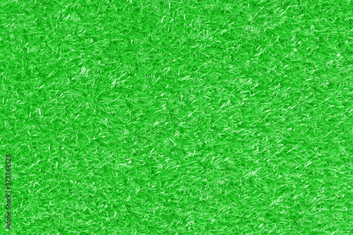 Green artificial grass texture background