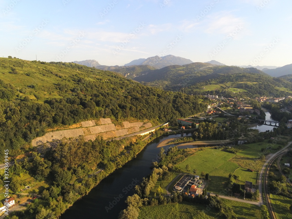 Asturias.Nalon River in beautiful landscape.Priañes.Spain.Aerial Drone Photo