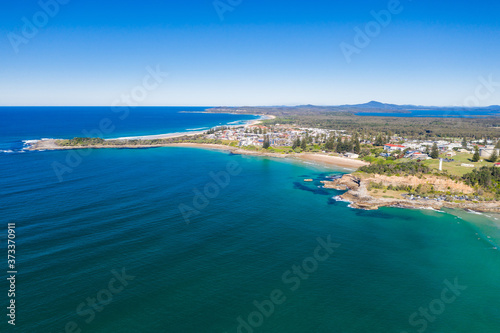 Yamba main beach and ocean pool bath aerial photograph on blue sky sunny day