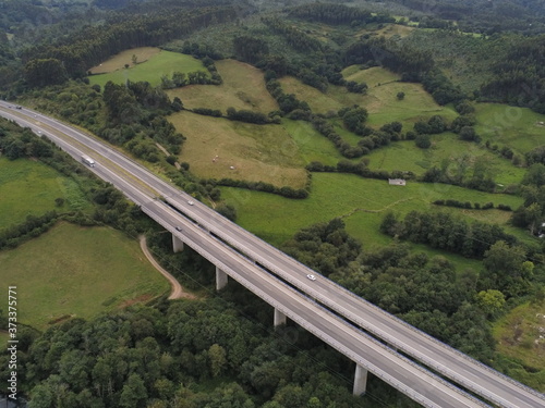 Road in landscape of Colunga, Asturias,Spain. Aerial Drone Photo