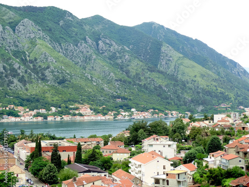 Aerial view of Kotor bay and old city in Kotor, Montenegro. Kotor is a coastal town in a secluded Gulf of Kotor, its preserved medieval old town is an UNESCO World Heritage Site. 