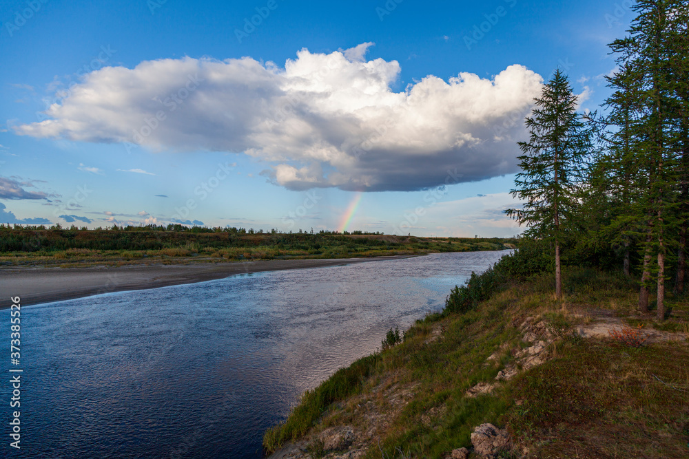 Landscape of the forest-tundra and the sandy river bank.