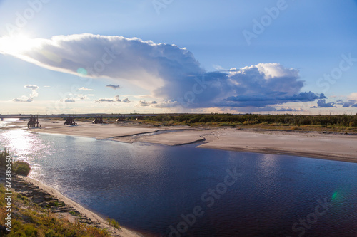 Landscape of the forest-tundra and the sandy river bank.