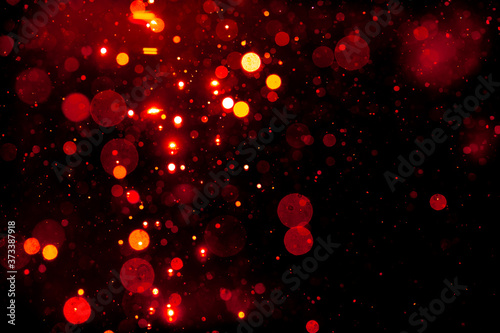 red bokeh on black background