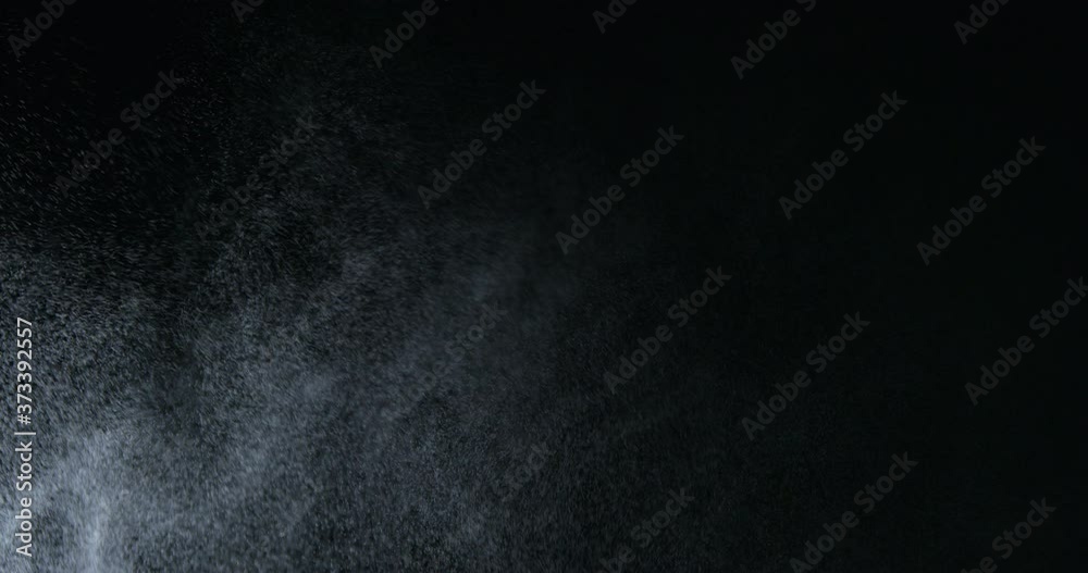 Water spray, microbes in air simulation, on black background

