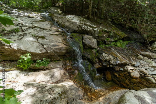 The Bully Brook Cascade provides a series of waterfalls and pools along the side of the Long Trail on the North side of White Rocks Mountain