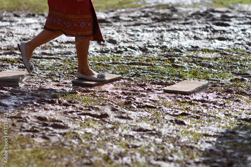 walking step over the dirt ground.