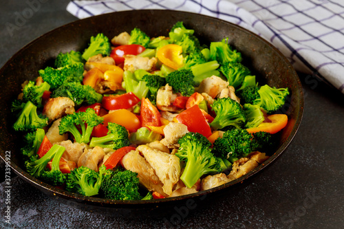 Colorful vegetable keto diet dish with chicken meat.
